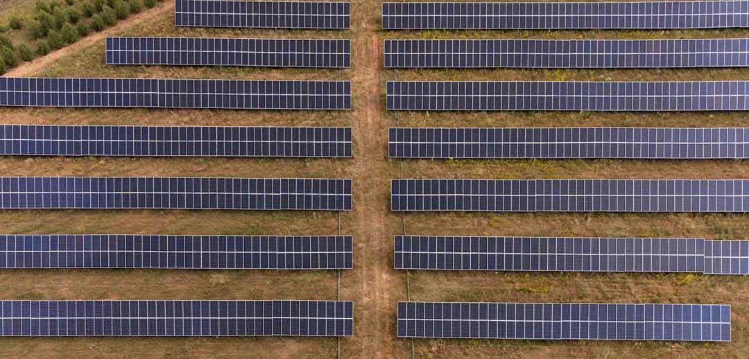 Image of a field with solar panels